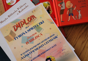 Dyplom dla Tymona Sprzeczki za zajęcie IV miejsca w XX edycji konkursu na najaktywniejszego czytelnika miejskiej biblioteki publicznej w Radomsku.